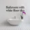 How Do You Design a Modern Bathroom with White Floor Tiles?