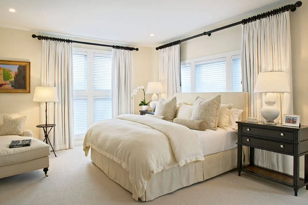 trendy curtains behind bed